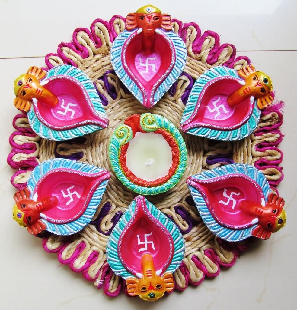 Lord Ganesha And Diyas Diwali Puja Decoration Picture