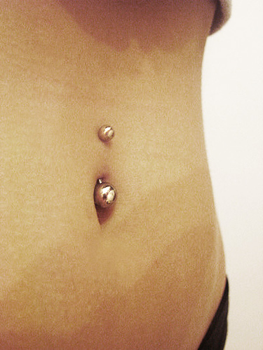 Navel Piercing With Curved Barbell