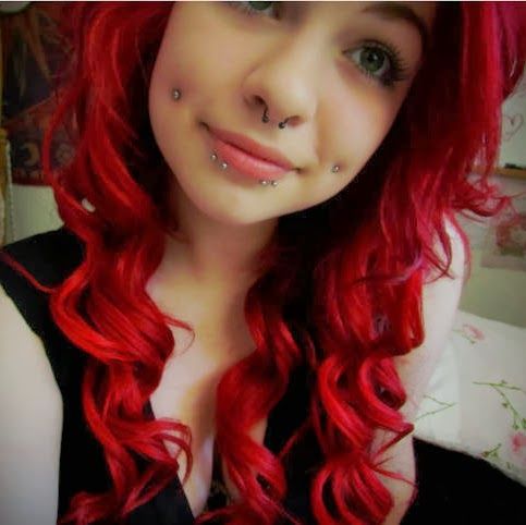 Septum Nose And Cheek Piercing Picture