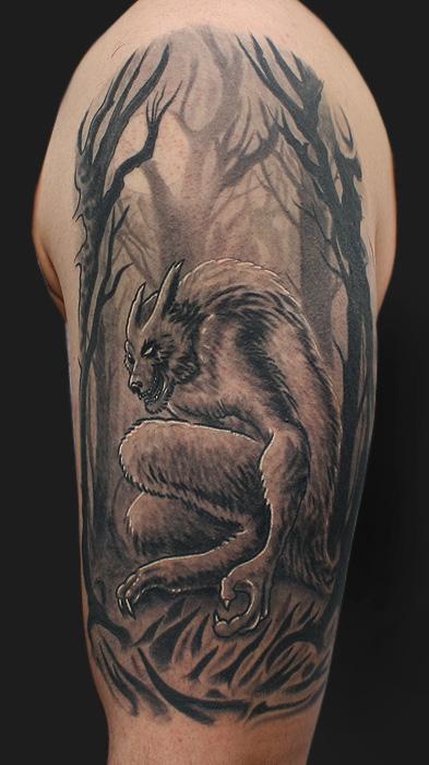 Sitting Werewolf Tattoo On Half Sleeve