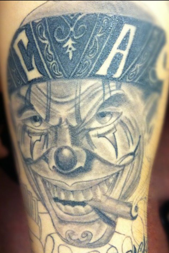 Smoking Gangster Clown Tattoo On Leg