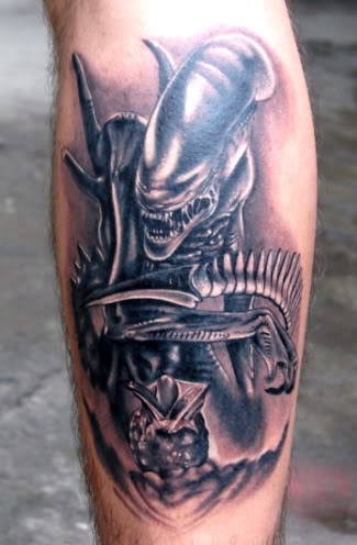 Alien Predator Tattoo On Back Leg
