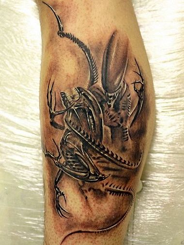 Alien Tattoo On Back Leg