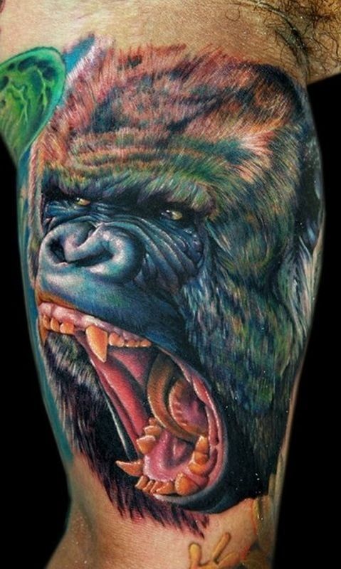 Amazing Colorful Gorilla Roaring Face Tattoo On Half Sleeve