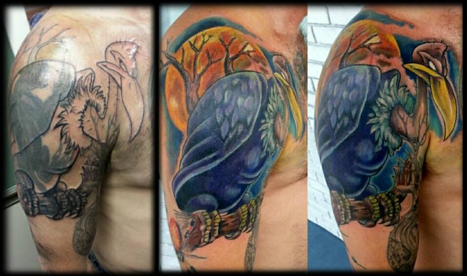 Amazing Vulture Sit On Branch Tattoo On Shoulder