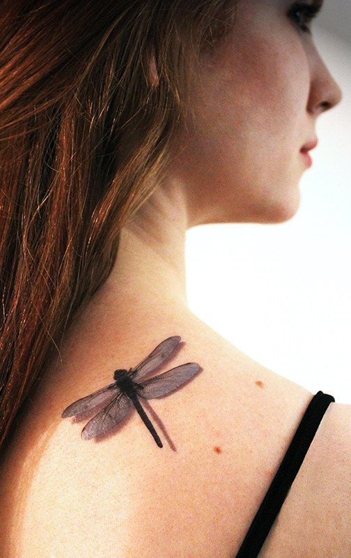 Black And Grey 3D Dragonfly Tattoo On Girl Back Shoulder