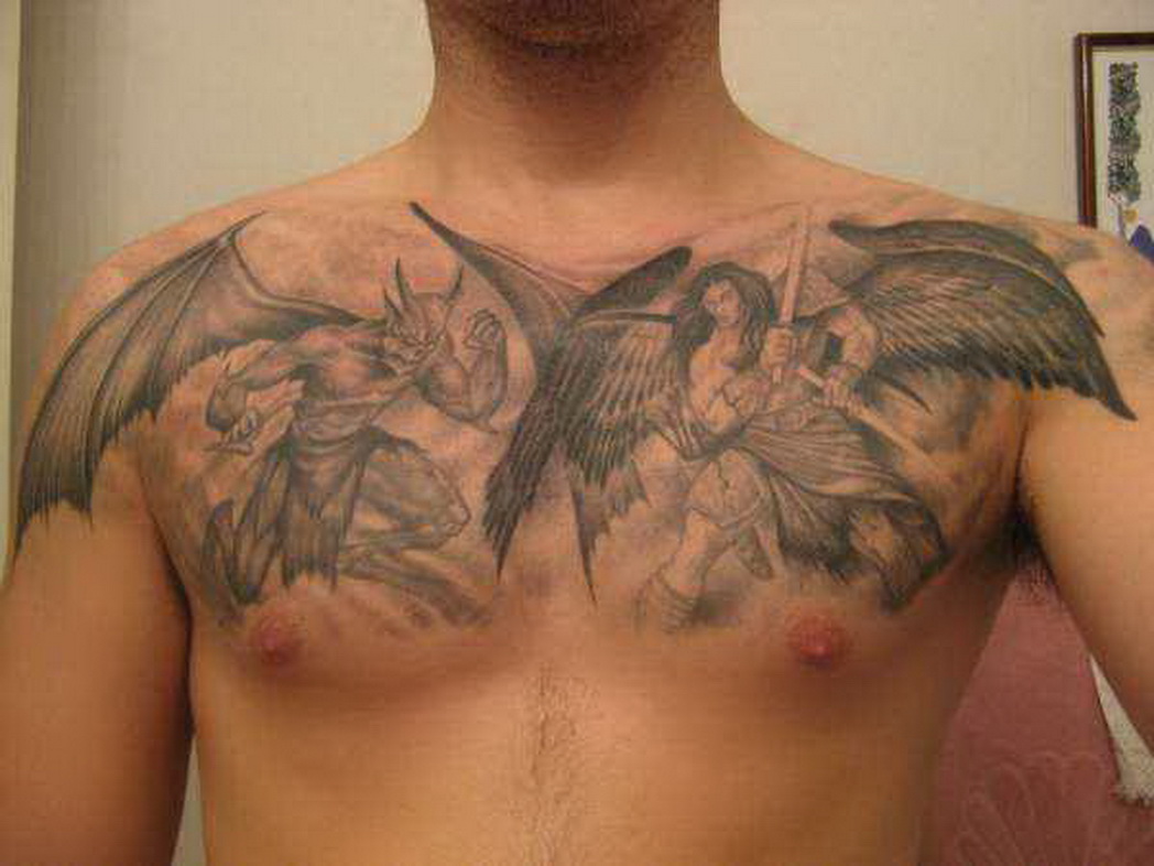 Black And Grey Demon & Angel Tattoo On Man Chest.