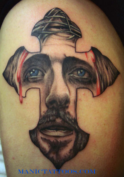 Black And Grey Jesus Face In Cross Tattoo On Shoulder