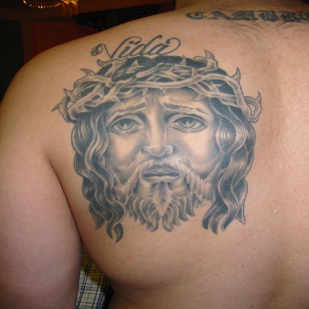 Black And Grey Jesus Face Tattoo On Back Shoulder By Mike P W