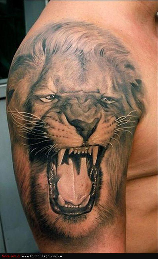 Black And Grey Lion Roaring Face Animal Tattoo On Man Shoulder