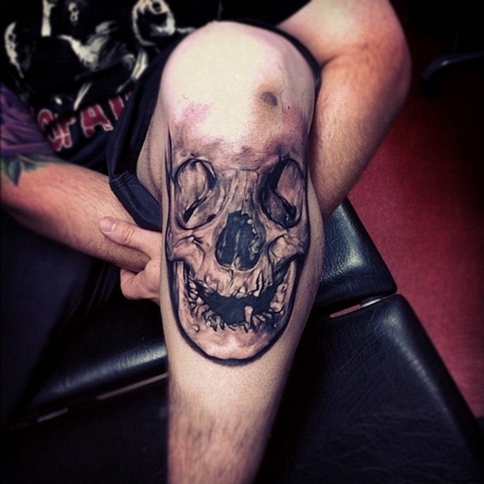 Black And Grey Skull Tattoo On Knee