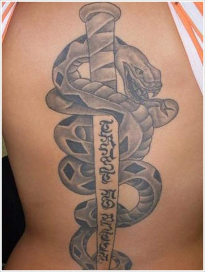 Black And Grey Snake With Dagger Tattoo On Side Rib