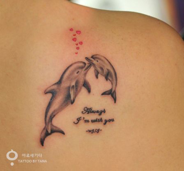 Black And Grey Two Cute Dolphins Tattoo On Back Shoulder