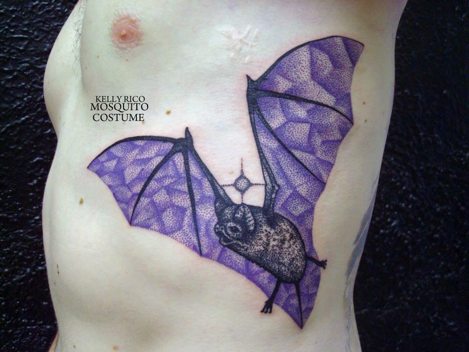 Black And Purple Flying Bat Tattoo On Side Rib