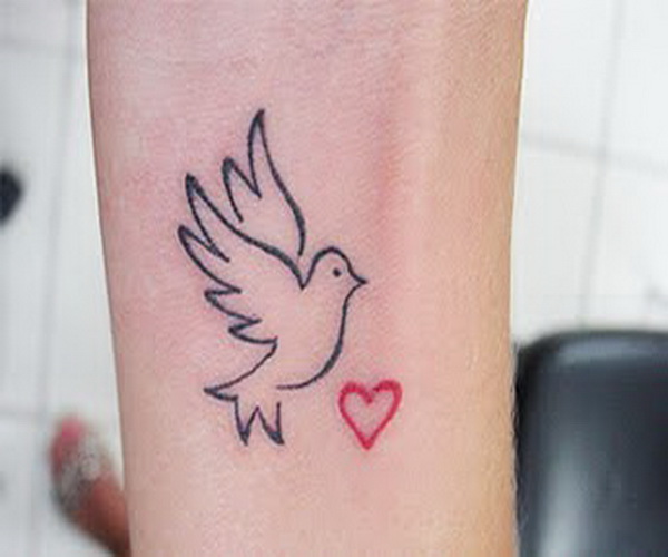 Black Dove With Red Heart Tattoo On Forearm