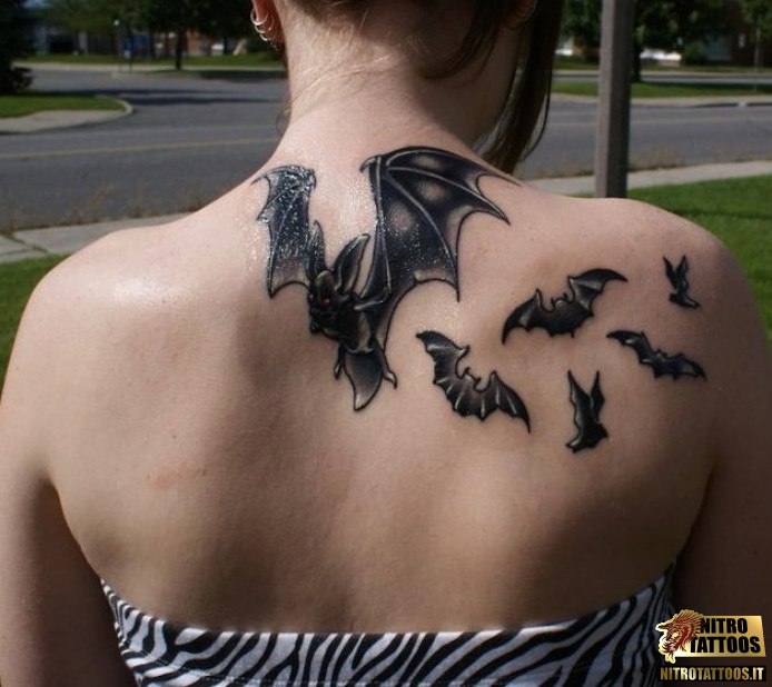 Black Flying Bats Tattoo On Girl Upper Back Shoulder