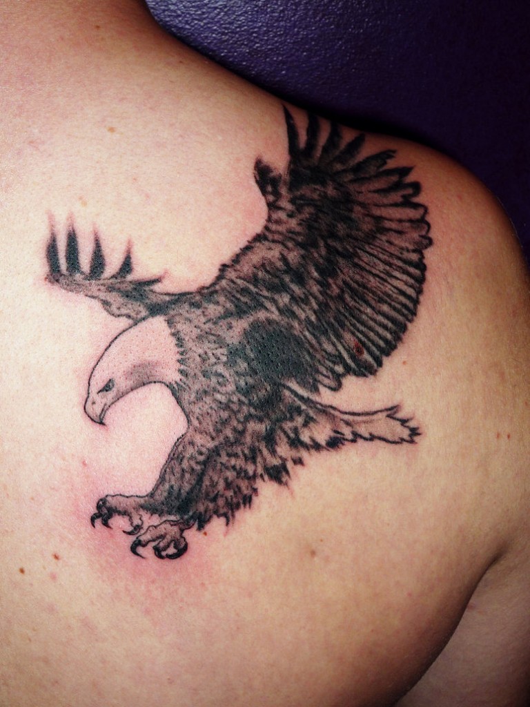 Black Flying Eagle Tattoo On Man Back Shoulder By Keith Durocher