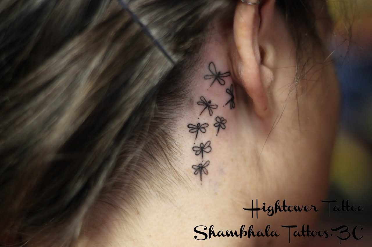 Black Little Dragonflies Tattoo On Girl Behind The Ear