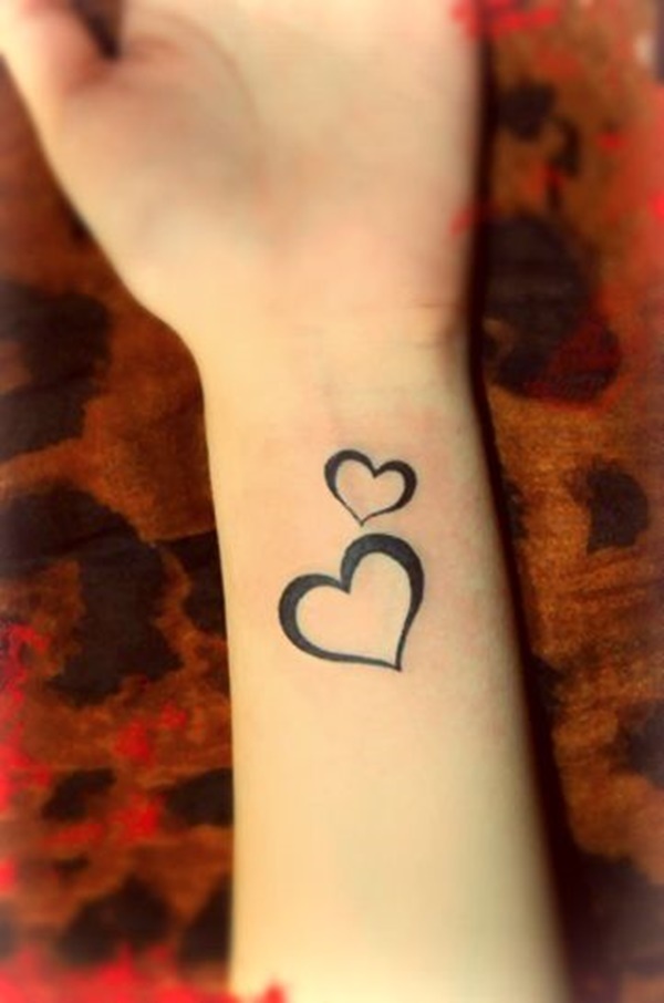 Black Little Two Heart Tattoo On Wrist