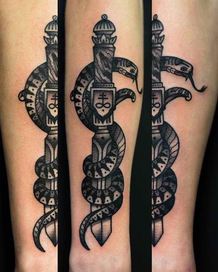Black Snake With Dagger Tattoo On Forearm By Philip Yarnell