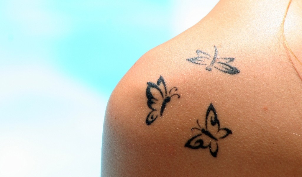 Black Three Tiny Butterflies Tattoo On shoulder