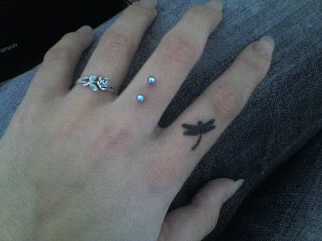 Black Tiny Dragonfly Tattoo On Finger By Laura Louise Twinkle Hudson