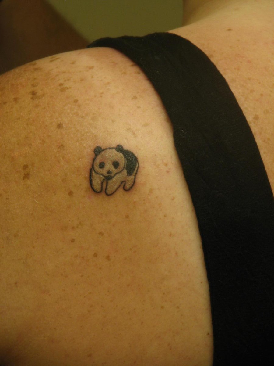Black Tiny Panda Cub Tattoo On Back Shoulder By Megan