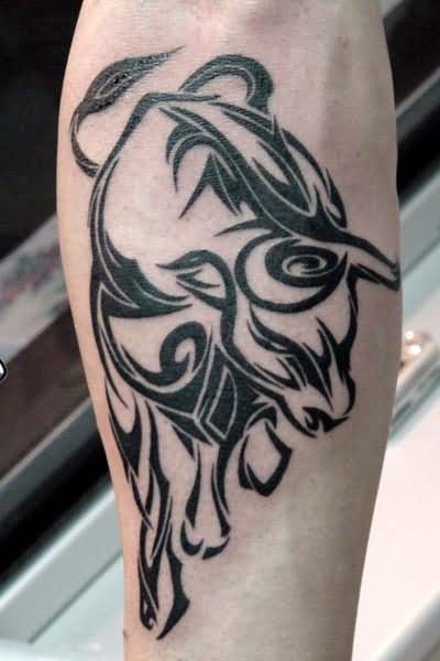 Black Tribal Bull Tattoo On Forearm