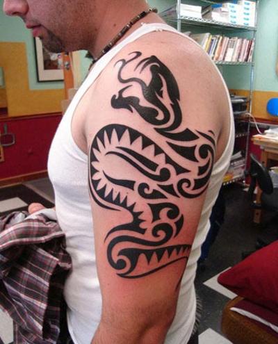 Black Tribal Snake Tattoo On Man Left Half Sleeve