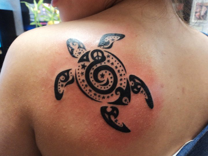 Black Tribal Turtle Tattoo On Girl Back Shoulder