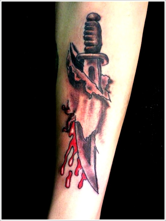 Bleeding Torn Skin Knife Tattoo On Arm