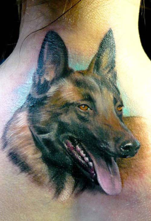 Colorful Dog Face Tattoo On Back By Adam Kremer