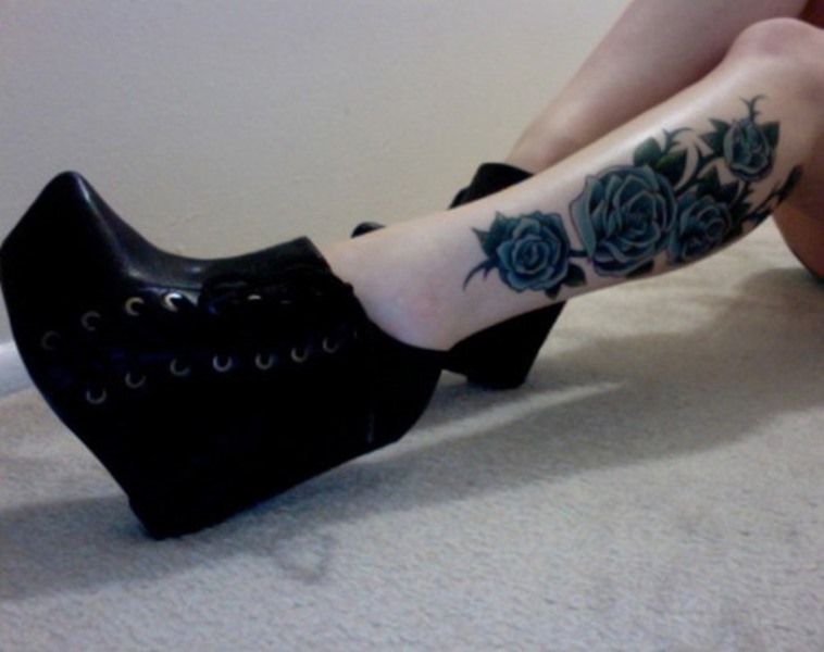 Four Blue Roses Tattoo On Girl Leg