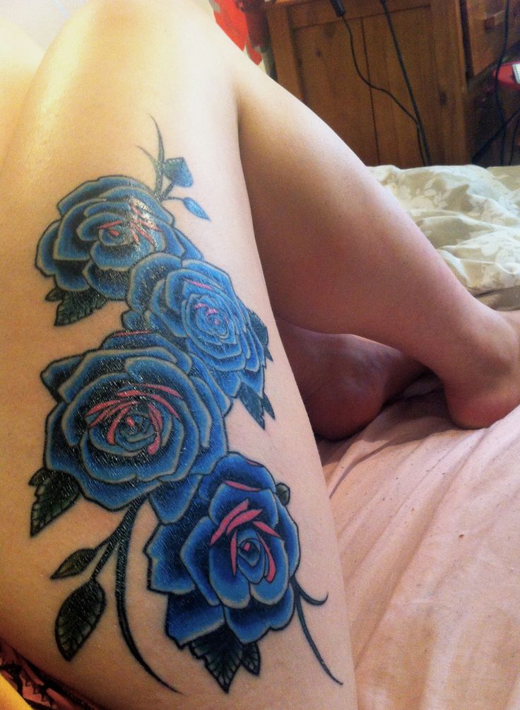 Four Blue Roses Tattoo On Thigh