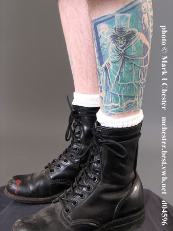 Green Hatbox Tattoo On Leg