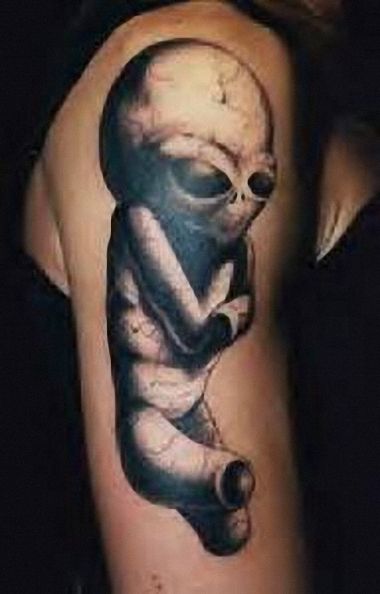 Grey Alien Tattoo On Right Half Sleeve