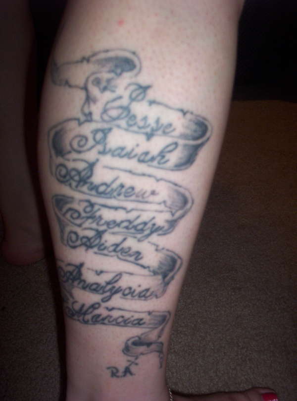 Grey Banner Tattoo On Right Leg