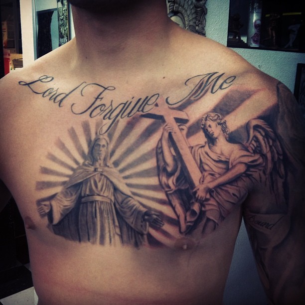 Grey Jesus With Angel Tattoo On Man chest