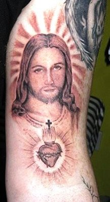 Grey Jesus With Cross Locket Tattoo On Half Sleeve