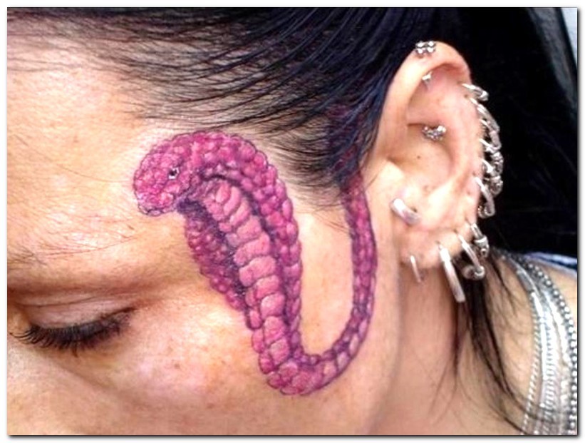Pink Snake Tattoo On Face