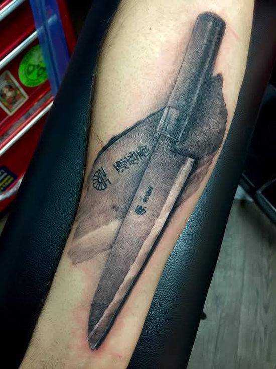 Realistic Chef Knife Tattoo On Forearm