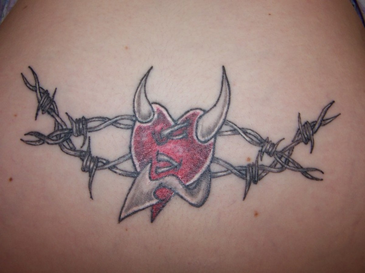 Red Devil Heart With Barbed Wire Tattoo Design