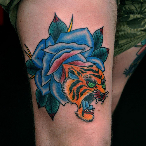 Tiger Face In Blue Rose Tattoo On Thigh By Phil Gibbs