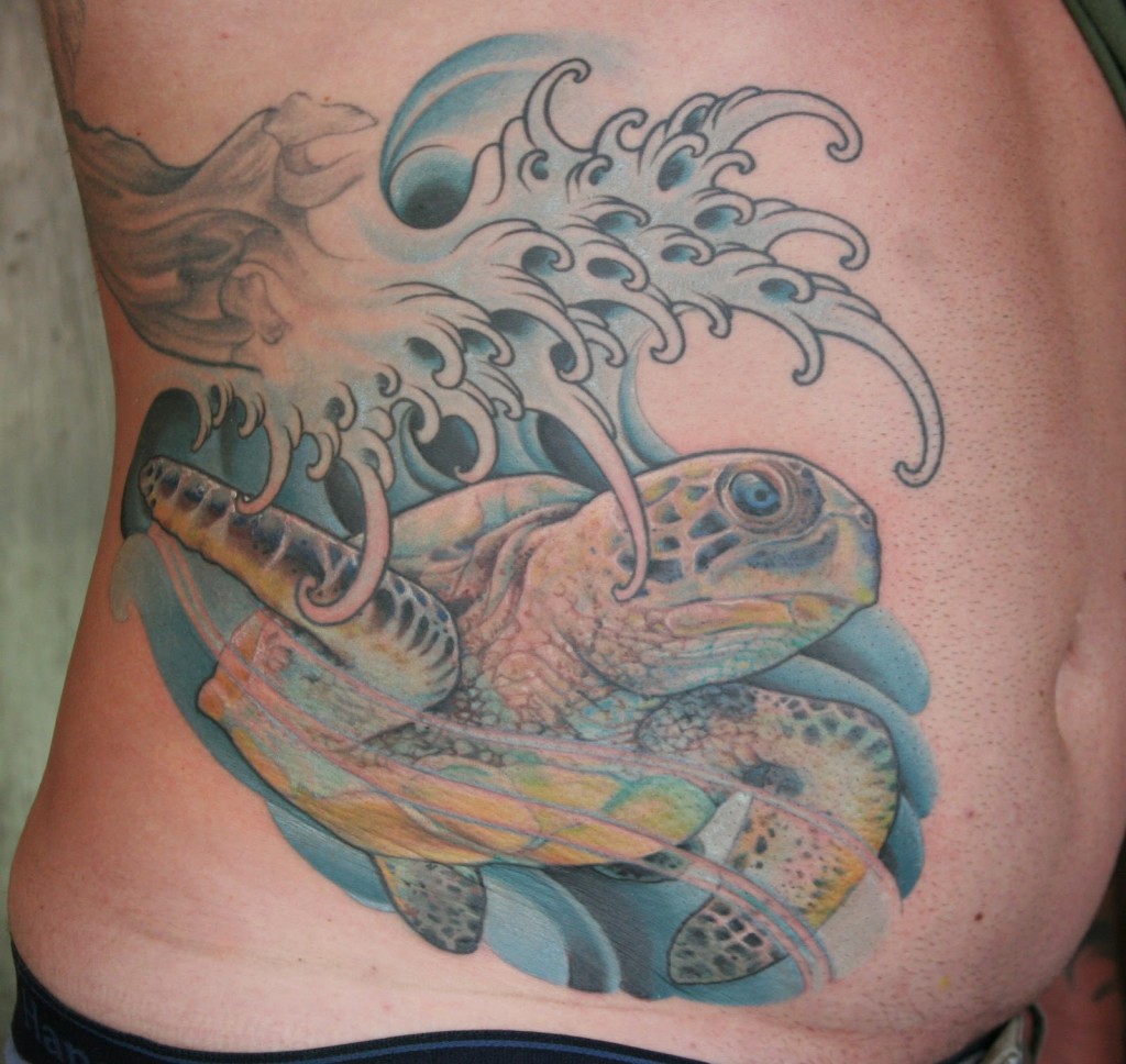 Watercolor Turtle In Ocean Tattoo On Man Side Rib