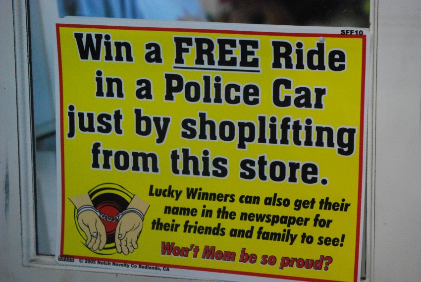 Win A Free Ride In A Police Just By Shoplifting From This Store Funny Sign Board