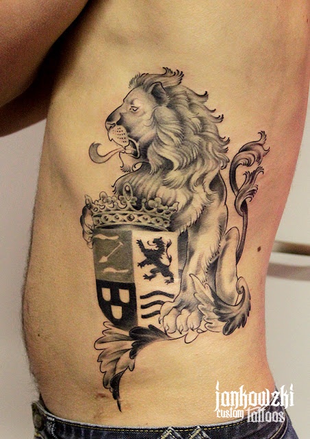 Black And Grey Lion With Family Crest Tattoo On Man Side Rib