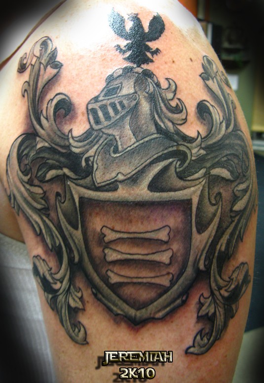 Black And Grey Three Bones In Family Crest Tattoo On Shoulder