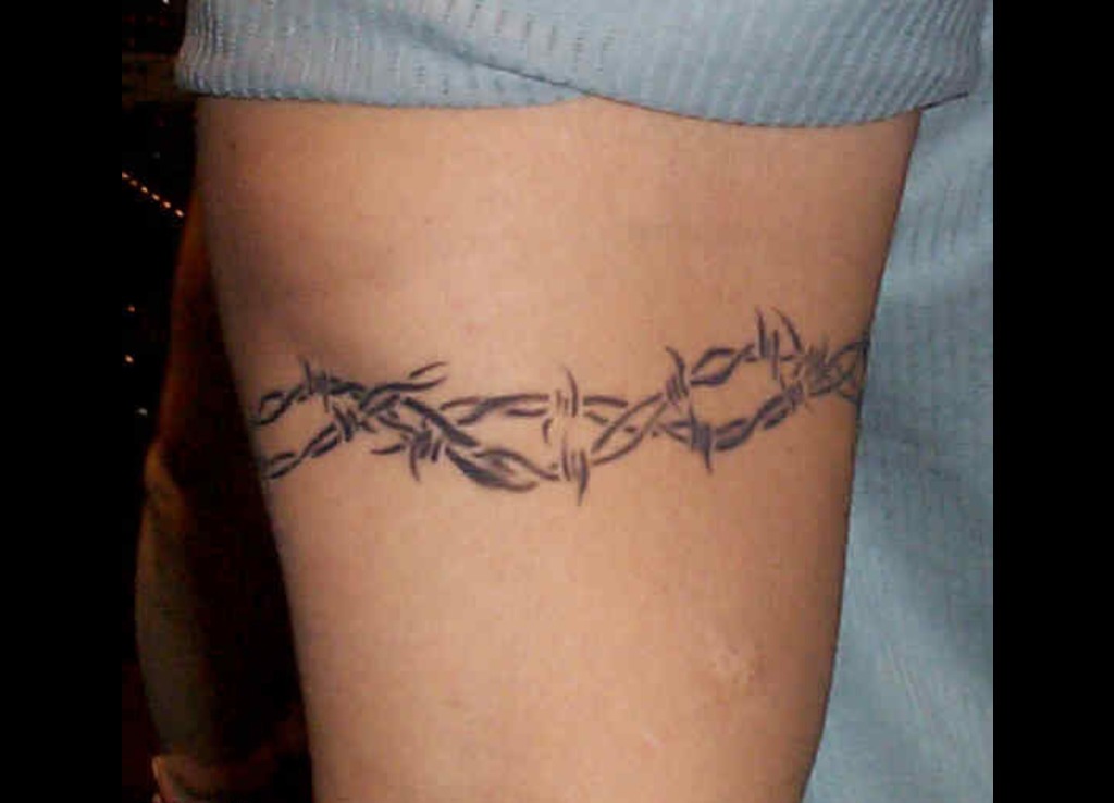 Black Barbed Wire Tattoo On Biceps