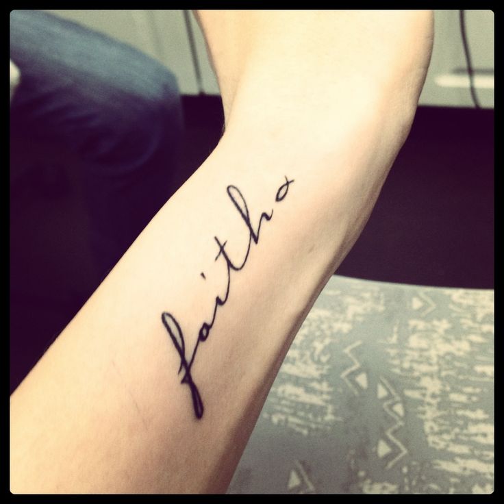 Black Faith Tattoo On Forearm