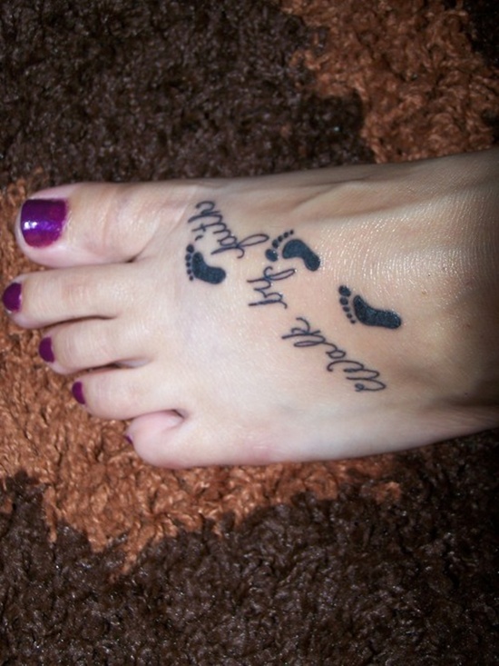 Black Walk By Faith With Foot Prints Tattoo On Foot